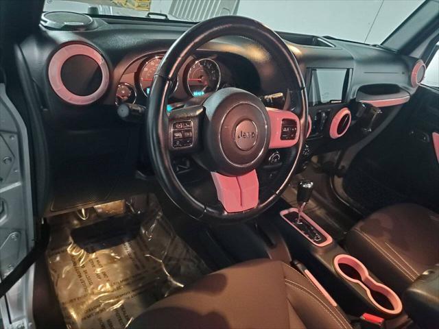 used 2015 Jeep Wrangler Unlimited car, priced at $17,494
