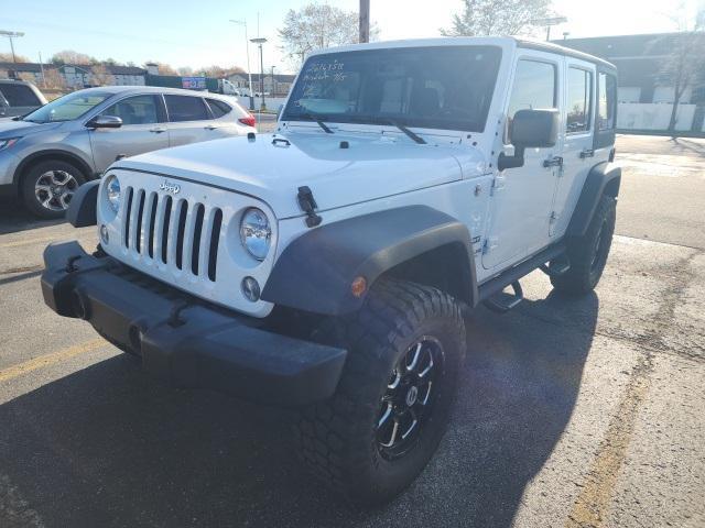 used 2015 Jeep Wrangler Unlimited car, priced at $19,477