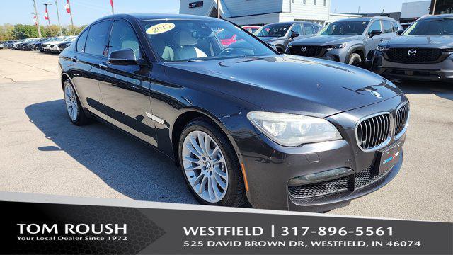 used 2015 BMW 750 car, priced at $12,482