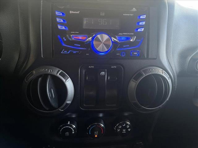 used 2015 Jeep Wrangler car, priced at $16,482