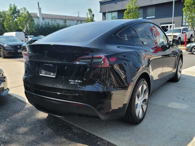 used 2023 Tesla Model Y car, priced at $24,876
