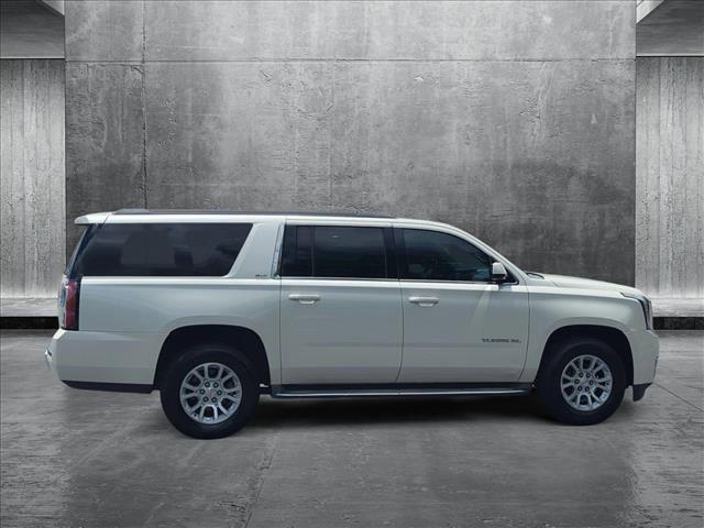 used 2015 GMC Yukon car, priced at $15,449