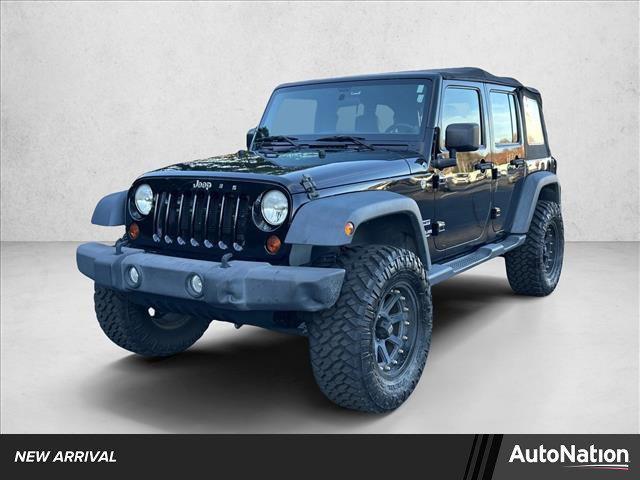 used 2012 Jeep Wrangler Unlimited car, priced at $12,986