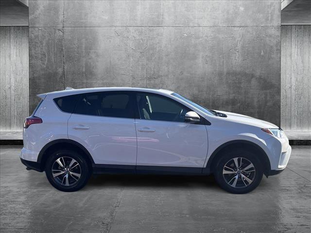 used 2018 Toyota RAV4 car, priced at $20,390