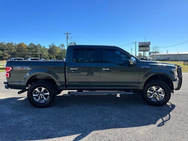 used 2018 Ford F-150 car, priced at $23,998