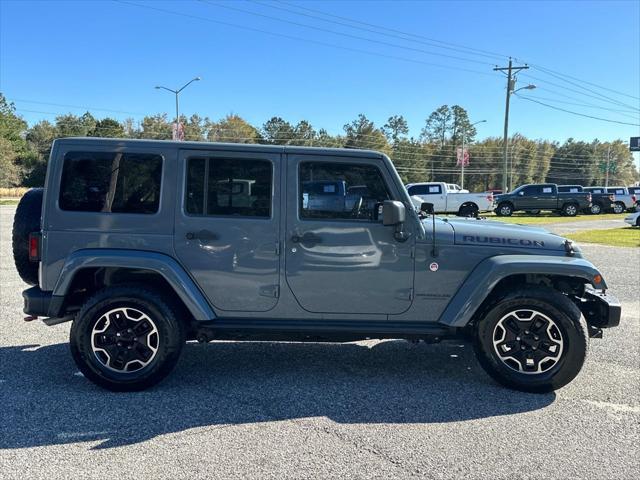 used 2015 Jeep Wrangler Unlimited car, priced at $18,998