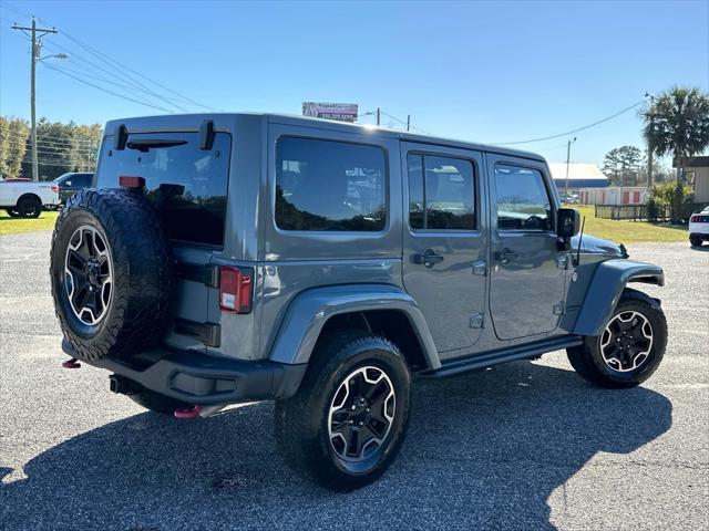 used 2015 Jeep Wrangler Unlimited car, priced at $18,998