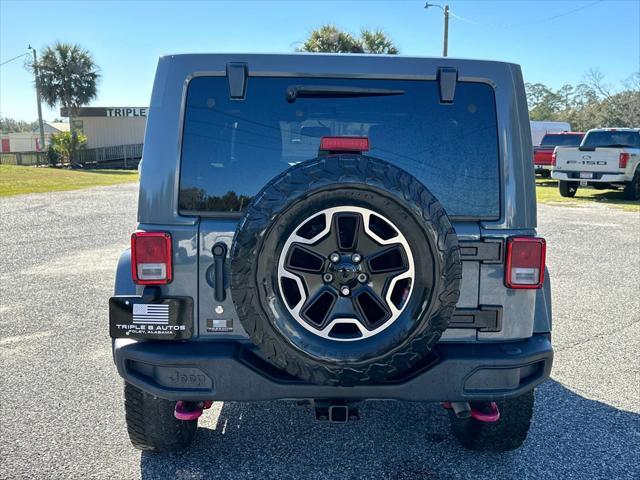 used 2015 Jeep Wrangler Unlimited car, priced at $18,998