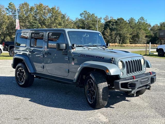 used 2015 Jeep Wrangler Unlimited car, priced at $18,998