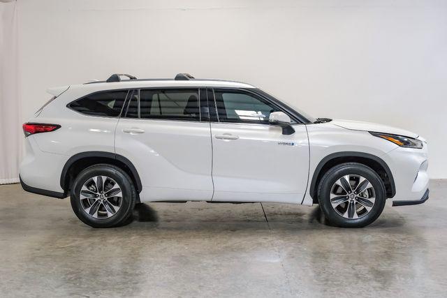 used 2021 Toyota Highlander Hybrid car, priced at $33,883