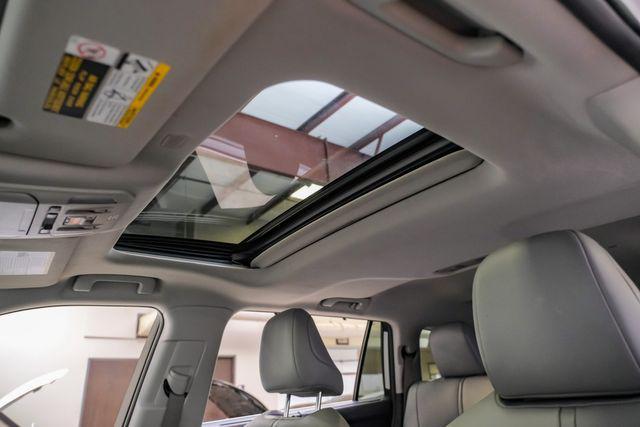 used 2021 Toyota Highlander Hybrid car, priced at $33,883