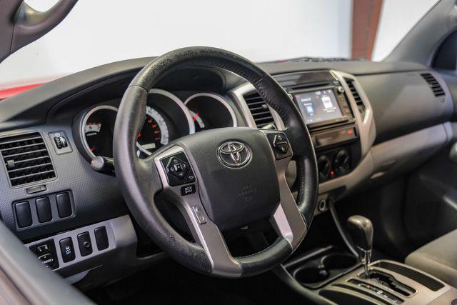 used 2015 Toyota Tacoma car, priced at $19,683