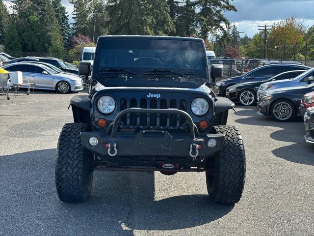 used 2013 Jeep Wrangler Unlimited car, priced at $18,950