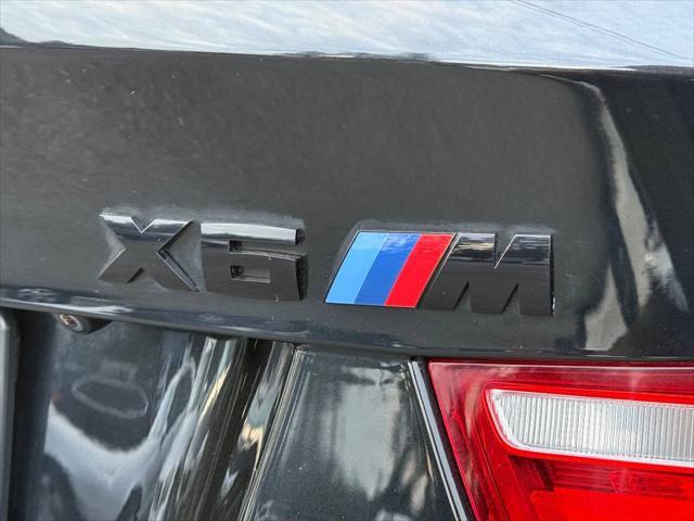 used 2014 BMW X6 M car, priced at $25,950