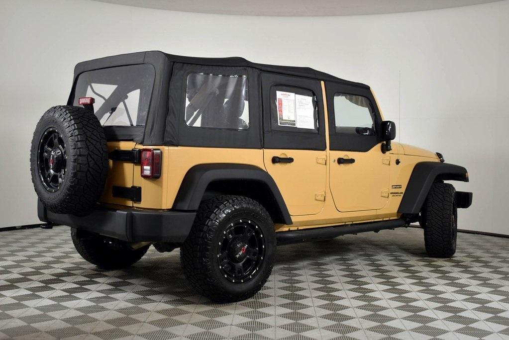 used 2014 Jeep Wrangler Unlimited car, priced at $21,994