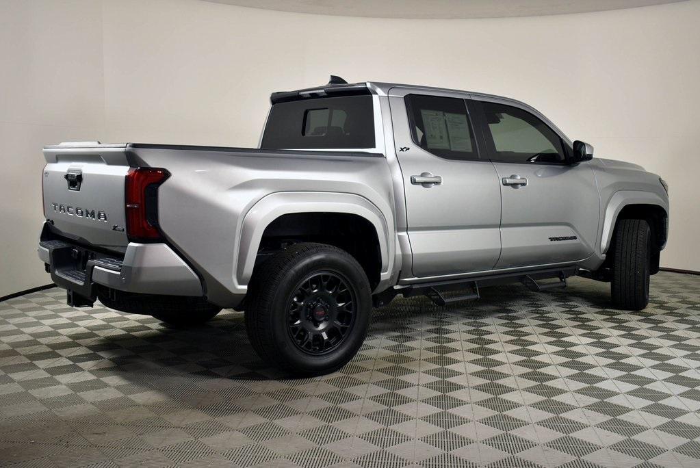 used 2024 Toyota Tacoma car, priced at $40,878