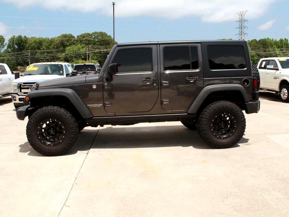 used 2014 Jeep Wrangler Unlimited car, priced at $25,995