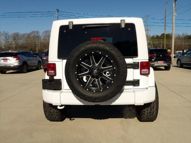 used 2014 Jeep Wrangler Unlimited car, priced at $21,995