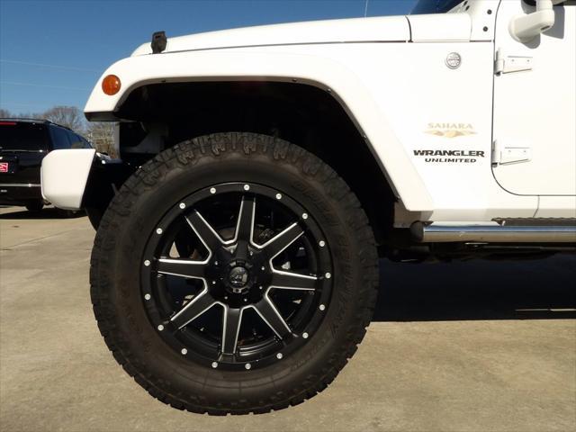 used 2014 Jeep Wrangler Unlimited car, priced at $21,995