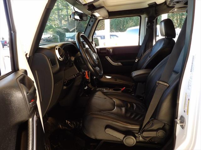 used 2014 Jeep Wrangler Unlimited car, priced at $21,995