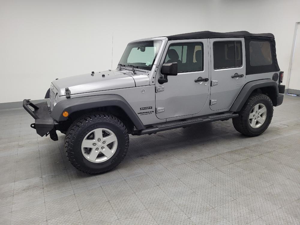 used 2016 Jeep Wrangler Unlimited car, priced at $20,195