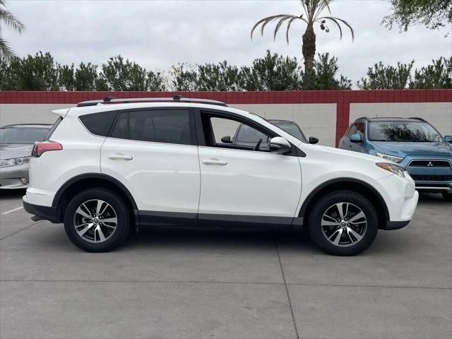 used 2018 Toyota RAV4 car, priced at $19,541