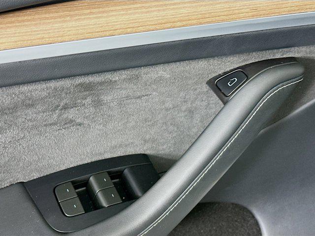 used 2024 Tesla Model Y car, priced at $31,797