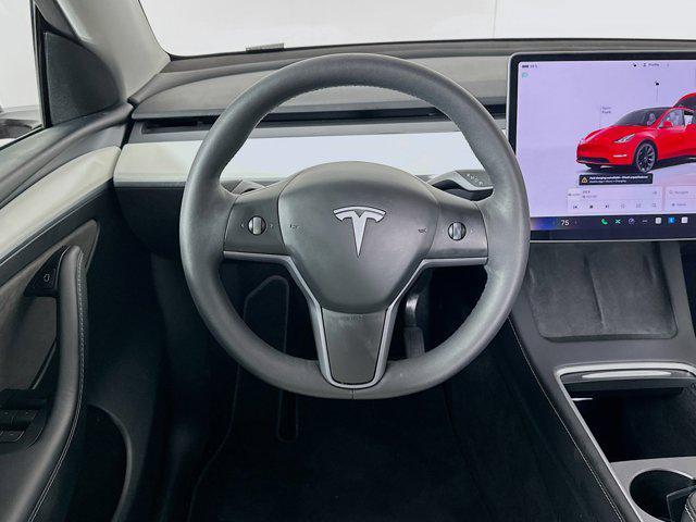 used 2024 Tesla Model Y car, priced at $34,997