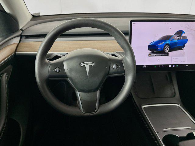 used 2023 Tesla Model Y car, priced at $30,899