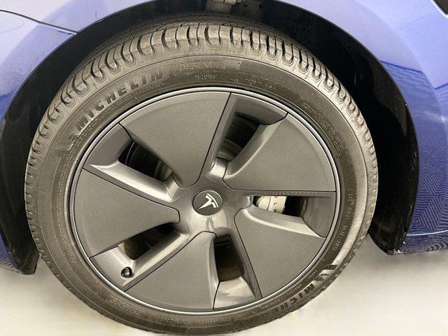 used 2023 Tesla Model 3 car, priced at $22,499