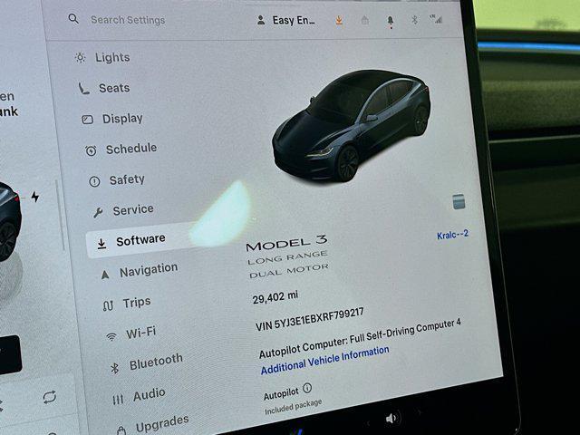 used 2024 Tesla Model 3 car, priced at $29,999