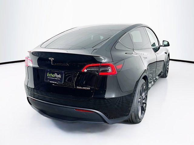 used 2025 Tesla Model Y car, priced at $37,697
