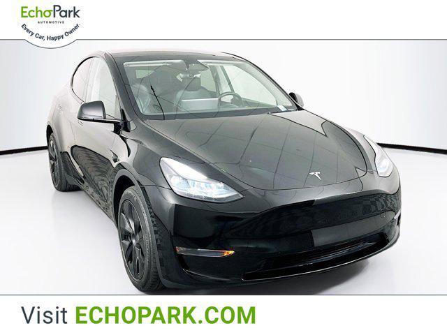 used 2025 Tesla Model Y car, priced at $35,497