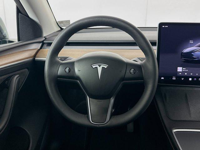 used 2025 Tesla Model Y car, priced at $36,497