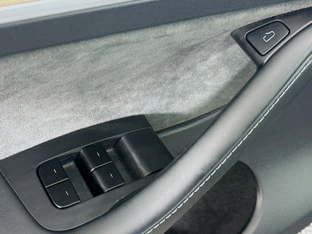 used 2025 Tesla Model Y car, priced at $36,497