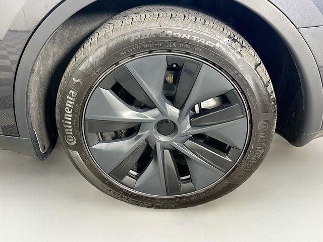 used 2025 Tesla Model Y car, priced at $36,497