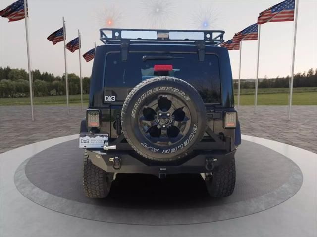 used 2015 Jeep Wrangler Unlimited car, priced at $19,449