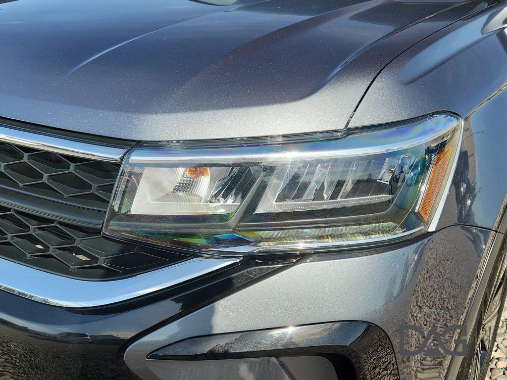 used 2024 Volkswagen Taos car, priced at $22,995