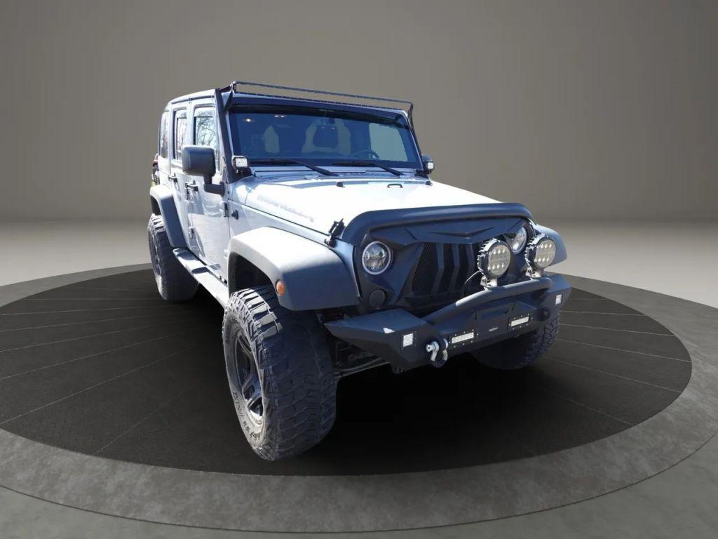 used 2018 Jeep Wrangler JK Unlimited car, priced at $19,900