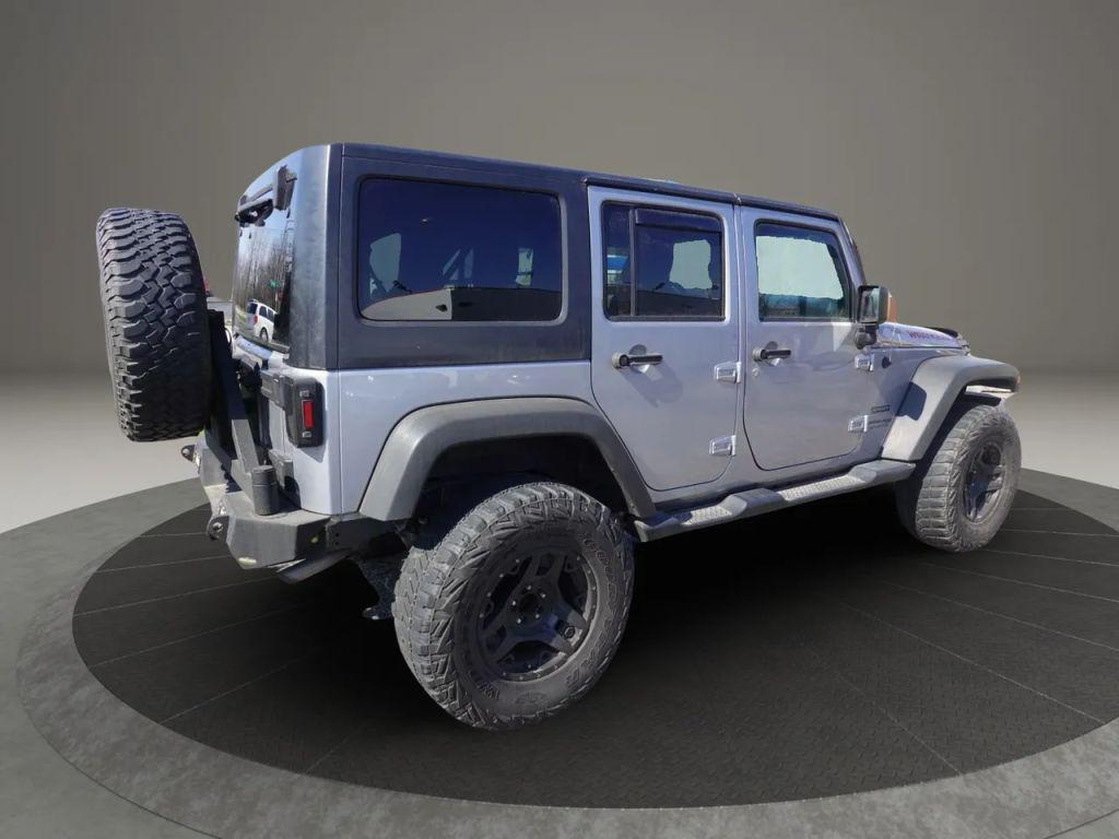 used 2018 Jeep Wrangler JK Unlimited car, priced at $19,900