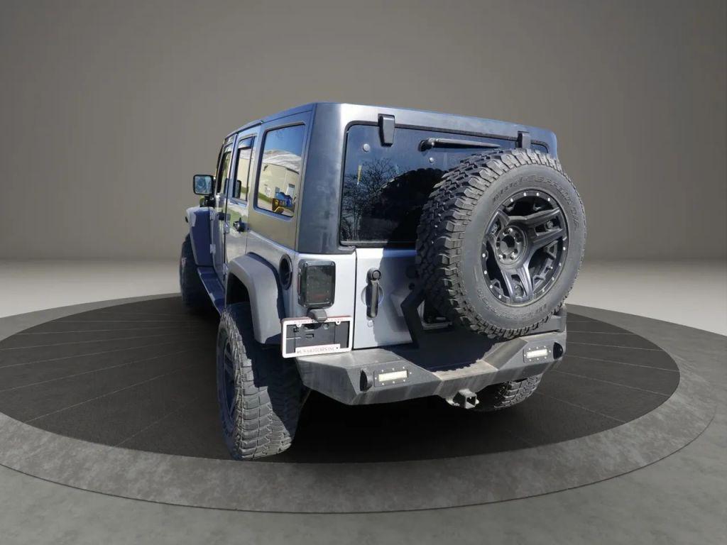 used 2018 Jeep Wrangler JK Unlimited car, priced at $19,900