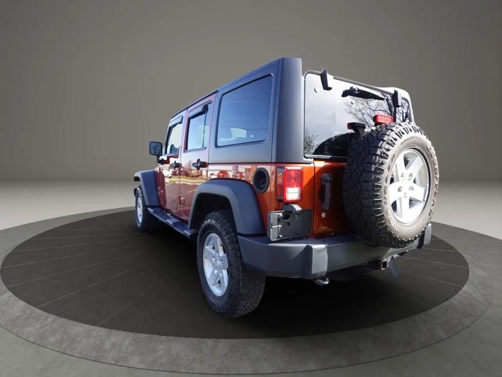 used 2014 Jeep Wrangler Unlimited car, priced at $17,500
