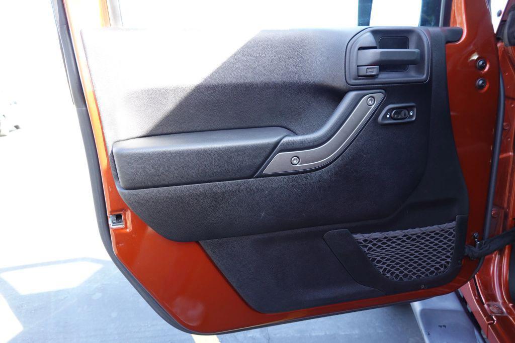 used 2014 Jeep Wrangler Unlimited car, priced at $17,500