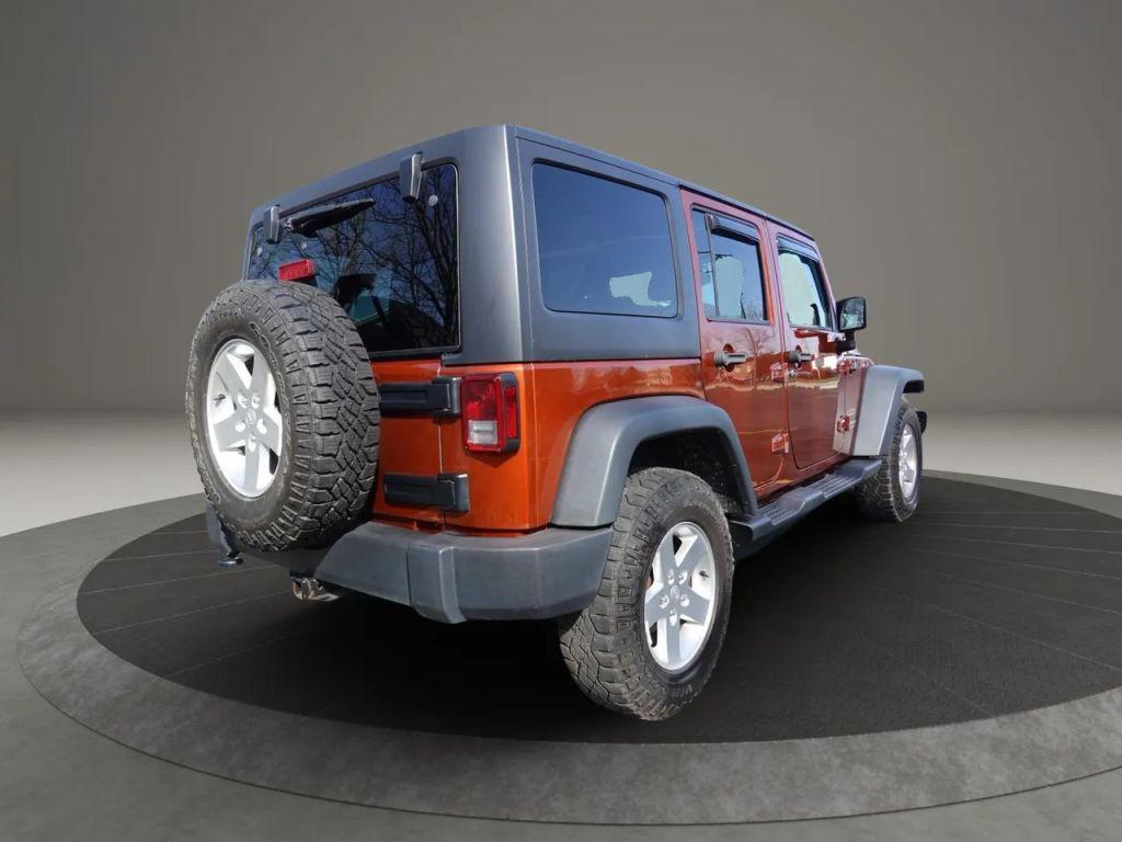 used 2014 Jeep Wrangler Unlimited car, priced at $17,500