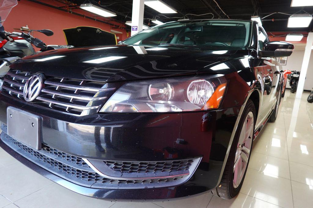 used 2014 Volkswagen Passat car, priced at $6,900