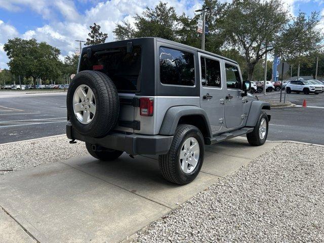 used 2014 Jeep Wrangler Unlimited car, priced at $15,978