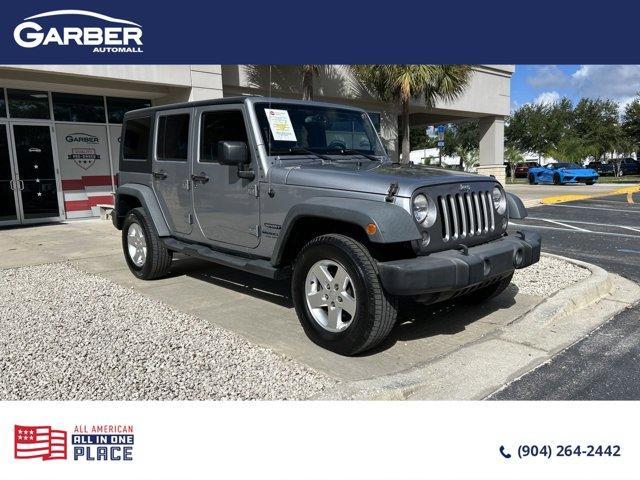 used 2014 Jeep Wrangler Unlimited car, priced at $15,978