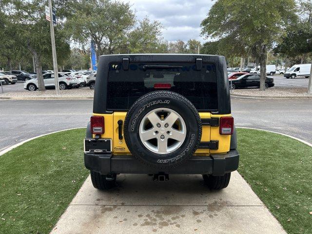 used 2015 Jeep Wrangler Unlimited car, priced at $19,431