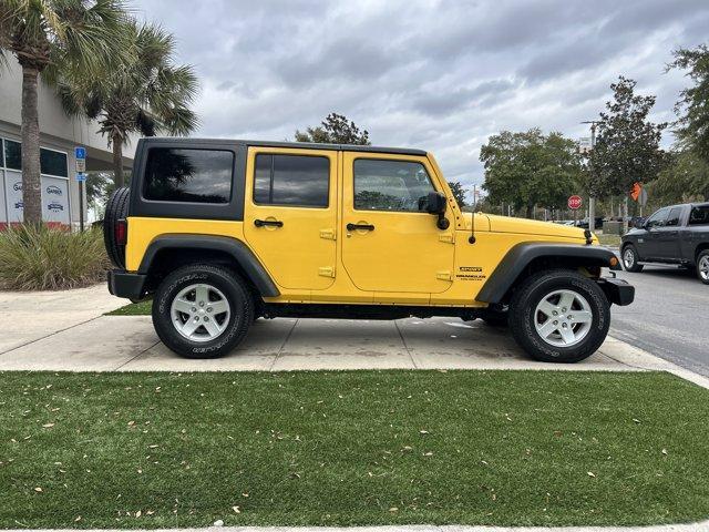 used 2015 Jeep Wrangler Unlimited car, priced at $19,431