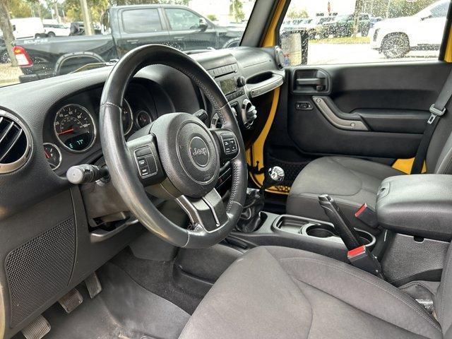 used 2015 Jeep Wrangler Unlimited car, priced at $19,431